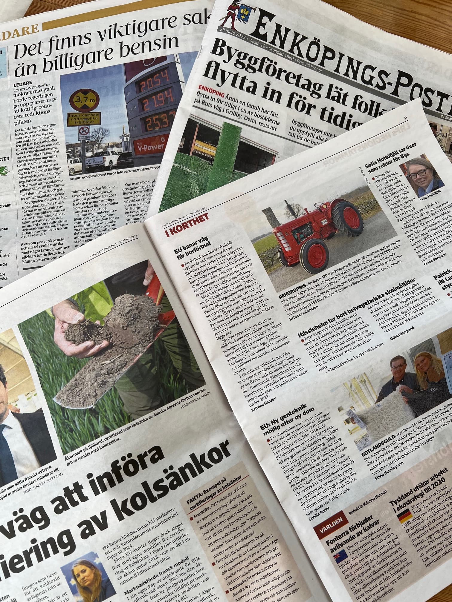 Tidningar med röd traktor rubrik med bensin